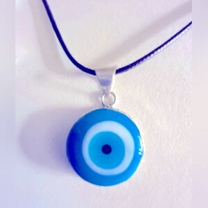 NWOT necklace Evil Eye Baby Blue 1” glass stone .925 silverplated bezel 18” cord